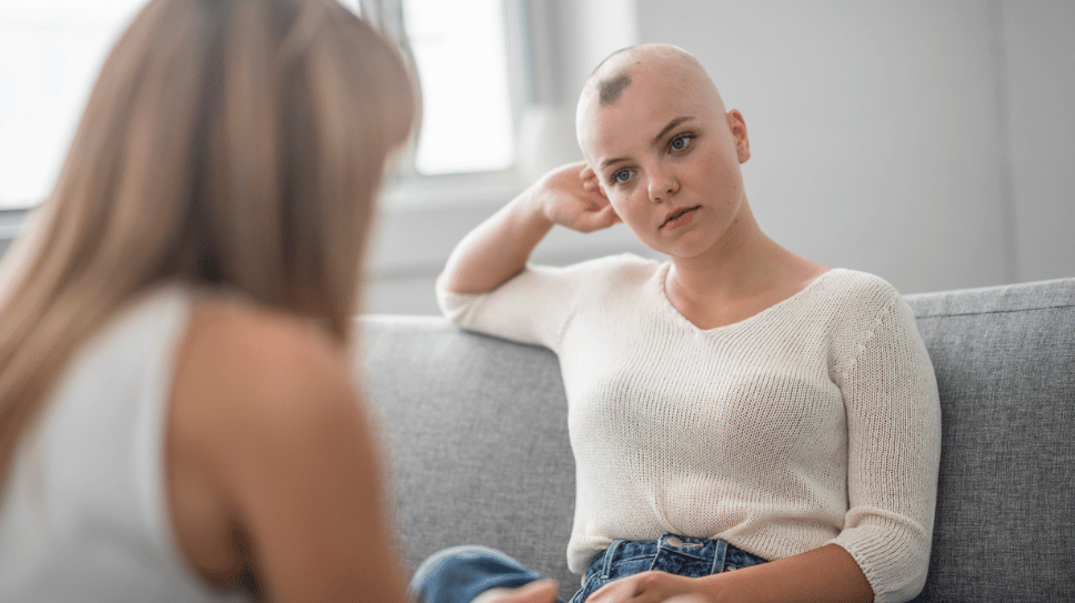 Cancer patient speaking to a mental health professional