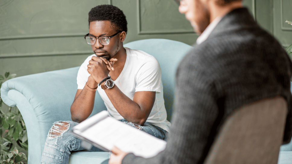 Young black man in therapy session