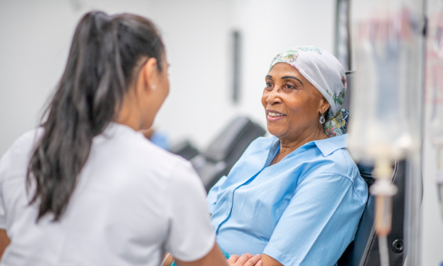 Cancer patient speaking to a mental health professional